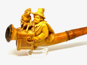 Antique Pipe Man with barrel organ and monkey