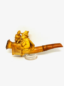 Antique Pipe Man with barrel organ and monkey