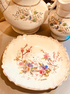 Vintage porcelain flower plate with gold rim